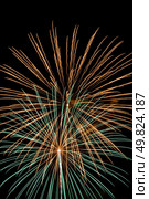 Firework streaks in the night sky during celebrations. Стоковое фото, агентство Ingram Publishing / Фотобанк Лори