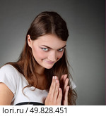portrait of hand-play girl. Studio shot. Стоковое фото, агентство Ingram Publishing / Фотобанк Лори