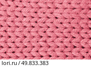 Pink knitted wool texture can use as background. Стоковое фото, агентство Ingram Publishing / Фотобанк Лори