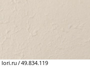 Cream textured paper closeup, can be used as a background. Стоковое фото, агентство Ingram Publishing / Фотобанк Лори