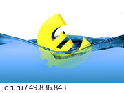 Currency euro sign or symbol sinking in water, concept for European crisis. It is a metaphor for financial,banking, economy,problem,danger or risk. Стоковое фото, агентство Ingram Publishing / Фотобанк Лори
