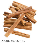 Cinnamon sticks on white reflective background. Стоковое фото, агентство Ingram Publishing / Фотобанк Лори