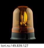 Orange siren for emergency car on black background. Стоковое фото, агентство Ingram Publishing / Фотобанк Лори
