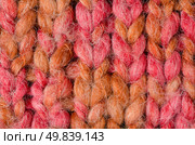 Pink knitted wool texture can use as background. Стоковое фото, агентство Ingram Publishing / Фотобанк Лори