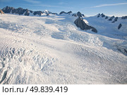 Aerial view of winter landscape at Mountain Cook National Park New Zealand from Helicopter. Стоковое фото, агентство Ingram Publishing / Фотобанк Лори
