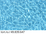 Refection of Blue water in Swimming pool with Ripple. Стоковое фото, агентство Ingram Publishing / Фотобанк Лори