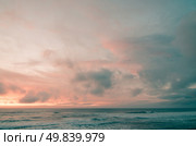 Sunset on a beach, beautiful sky and silky water. Стоковое фото, агентство Ingram Publishing / Фотобанк Лори