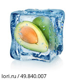Mango in ice cube isolated on a white background. Стоковое фото, агентство Ingram Publishing / Фотобанк Лори