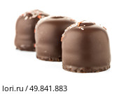 Chocolate coated marshmallows isolated on white background. Стоковое фото, агентство Ingram Publishing / Фотобанк Лори