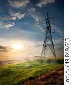 Electric pole and autumn field at sunrise. Стоковое фото, агентство Ingram Publishing / Фотобанк Лори