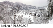 Aerial Shirakawago panorama winter Snow Gifu Chubu Japan. Стоковое фото, агентство Ingram Publishing / Фотобанк Лори