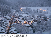 Shirakawago light-up with Snowfall Gifu Chubu Japan. Стоковое фото, агентство Ingram Publishing / Фотобанк Лори