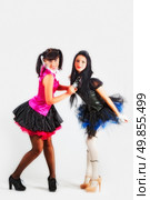 Two attractive girls in the costumes of anime. Стоковое фото, агентство Ingram Publishing / Фотобанк Лори