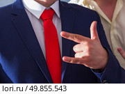 men’s blue suit and red tie. Стоковое фото, агентство Ingram Publishing / Фотобанк Лори