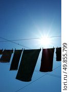 Silhouette of linens on the rope. Conceptual scene. Стоковое фото, агентство Ingram Publishing / Фотобанк Лори