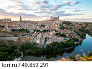 Toledo Cityscape with Alcazar at dusk in Madrid Spain. Стоковое фото, агентство Ingram Publishing / Фотобанк Лори