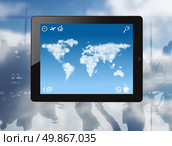 ipad with world map made of clouds on screen. tablet pc with world map made of clouds and drawn icons on screen against airport background. Стоковое фото, агентство Ingram Publishing / Фотобанк Лори
