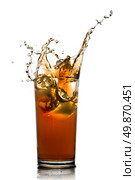 Beautiful splash of cola in glass isolated on white. Стоковое фото, агентство Ingram Publishing / Фотобанк Лори