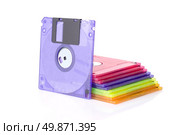 Color floppy disks isolated on white. Стоковое фото, агентство Ingram Publishing / Фотобанк Лори