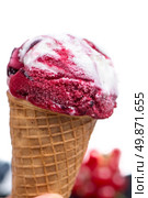 Ice cream cone with scoop of red fruits isolated on white background. Стоковое фото, агентство Ingram Publishing / Фотобанк Лори