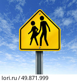 Sexual abuse in schools with a warning sign of a sex predator abusing and attacking young innocent student victims represented by a yellow hazard sign with the criminal act illustrated as a symbol. Стоковое фото, агентство Ingram Publishing / Фотобанк Лори
