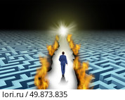 Innovative leadership and trail blazing or trailblazing business concept with a businessman walking through a maze or labyrinth that is open due to a burning path as a symbol of creative solutions. Стоковое фото, агентство Ingram Publishing / Фотобанк Лори