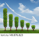 Business decrease and profit reduction as a group of fruit trees as a financial graph declining in size due to loss with a cloud shaped arrow pointing down as a finance concept. Стоковое фото, агентство Ingram Publishing / Фотобанк Лори