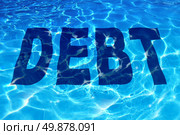 Drowning in debt business and finance concept with the word icon sinking under a sparkling reflection of blue pool of water as a symbol of financial problems to pay debts owing resulting in budget management desperation. Стоковое фото, агентство Ingram Publishing / Фотобанк Лори