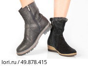 Beautiful female legs in black boots different on a white background. Стоковое фото, агентство Ingram Publishing / Фотобанк Лори