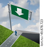 Employment demotion as a businessman at a crossroads in his career with a down arrow on a highway sign guiding the employee down a set of stairs being demoted as a business job failure with low pay. Стоковое фото, агентство Ingram Publishing / Фотобанк Лори