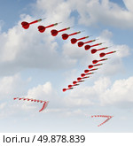 Mobile strategy as a business concept and metaphor with a group of organized red darts in a migratory bird formation as a symbol of changing course and adapting to new economic conditions and searching new goals and aiming for opportunities. Стоковое фото, агентство Ingram Publishing / Фотобанк Лори