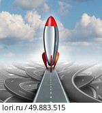 Business take off concept with a rocket ship on a straight road over a sky background of tangled streets as a freedom metaphor for escaping and taking an opportunity for higher financial success. Стоковое фото, агентство Ingram Publishing / Фотобанк Лори