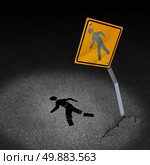 Traffic accident injury concept as a damaged road sign with a person pedestrian symbol fallen on the floor with broken bones and physical pain after a car crash as a metaphor for accident insurance or drunk driving dangers. Стоковое фото, агентство Ingram Publishing / Фотобанк Лори