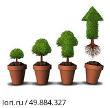 Investing money and financial growth success concept as a group of plant pots as gradual growing trees with a mature tree shaped as an arrow taking off upward free from the constraints of home as a symbol for economic investment. Стоковое фото, агентство Ingram Publishing / Фотобанк Лори