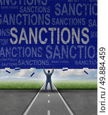 Lifting Sanctions as a global economic symbol for solutions to trade disputes as a man lifting a brick wall with words as a metaphor for diplomatic success in negotiating government agreements for easing financial pressure. Стоковое фото, агентство Ingram Publishing / Фотобанк Лори