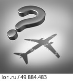 Aviation disaster question and air safety concept as a flying three dimensional question mark with a cast shadow of a damaged airplane as a symbol for uncertainty. Стоковое фото, агентство Ingram Publishing / Фотобанк Лори