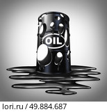 Oil collapse industry concept as a barrel full of holes of crude petroleum with liquid spilled on the floor as a business metaphor for energy price drop. Стоковое фото, агентство Ingram Publishing / Фотобанк Лори