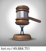 Legal protection and law advice concept as an attorney blocking a gavel or judge mallet from completing a verdict or getting a pardon as a symbol for lawyer services to protect a defendant or victim or legislator fighting for citizen rights. Стоковое фото, агентство Ingram Publishing / Фотобанк Лори
