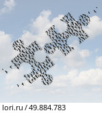Flying birds puzzle as a business concept for group strategy as two flocks of geese shaped as jigsaw puzzle pieces comming together as a teamwork success metaphor. Стоковое фото, агентство Ingram Publishing / Фотобанк Лори