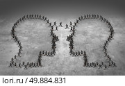 Teamwork leadership business concept or employee poaching symbol as a group of running businesspeople shaped as two heads meeting together as an icon for human resource management or economic trade strategy. Стоковое фото, агентство Ingram Publishing / Фотобанк Лори