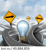Strategic Ideas concept as a business symbol with a lightbulb or light bulb choosing the right strategic path for a new creative way with yellow traffic signs arrows and tangled roads and highways in a confused direction. Стоковое фото, агентство Ingram Publishing / Фотобанк Лори