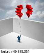 Overcome business barriers as two partners separated by walls in a joint effort to merge two flying red balloons shaped as half a gear or cog as a symbol for trade success and global trade solutions. Стоковое фото, агентство Ingram Publishing / Фотобанк Лори