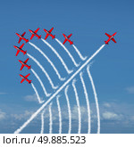 Disruptive innovation Independent leadership concept and individuality as a group of acrobatic jets with one individual jet going in the opposite direction as a business symbol for new thinking and attitude as a different nonconformist maverick. Стоковое фото, агентство Ingram Publishing / Фотобанк Лори