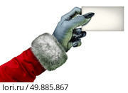 Selfish holiday monster or miser character holding a blank card as a cheapskate scrooge hand symbol wearing a red coat as an icon for winter selfishness behavior isolated on a white background.

. Стоковое фото, агентство Ingram Publishing / Фотобанк Лори