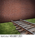 Road block or roadblock concept as a closed brick wall barricade blocking a train track as a business or life  closed metaphor for restriction or embargo symbol. Стоковое фото, агентство Ingram Publishing / Фотобанк Лори