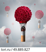 Smoking cancer health care concept as a human cancer cell shaped as an air balloon with a lit smoking tobacco cigarette butt creating smoke and heat for the cancerous symbol to rise as a 3D illustration. Стоковое фото, агентство Ingram Publishing / Фотобанк Лори