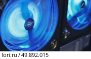 Highspeed spinning cooling fans with vibrant blue led lights. Стоковое AI-видео, аниматор Владимир Федоров / Фотобанк Лори