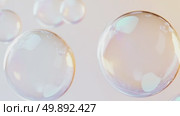Soap bubbles floating on soft gradient background. Стоковое AI-видео, аниматор Анастасия Золотницкая / Фотобанк Лори