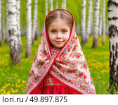 A little Russian beauty in a bright Pavlovo Posad shawl against the backdrop of birches. Стоковое AI-изображение, AI-художник Сергей Елизарьев / Фотобанк Лори