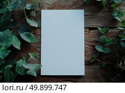 A pristine white sheet of paper ready for writing, encircled by lush foliage on a rich wooden background. Стоковое AI-изображение, AI-художник Данила Большаков / Фотобанк Лори